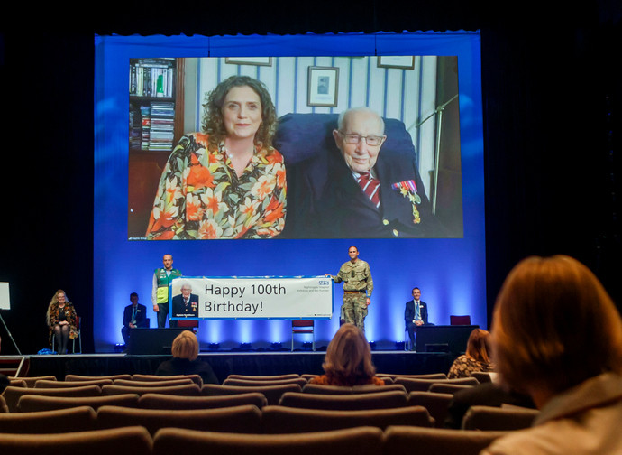 Captain Tom Moore, right on screen, and his daughter Hannah Ingram-Moore speaking via video-link at the opening of NHS Nightingale Hospital Yorkshire and Humber in Harrogate