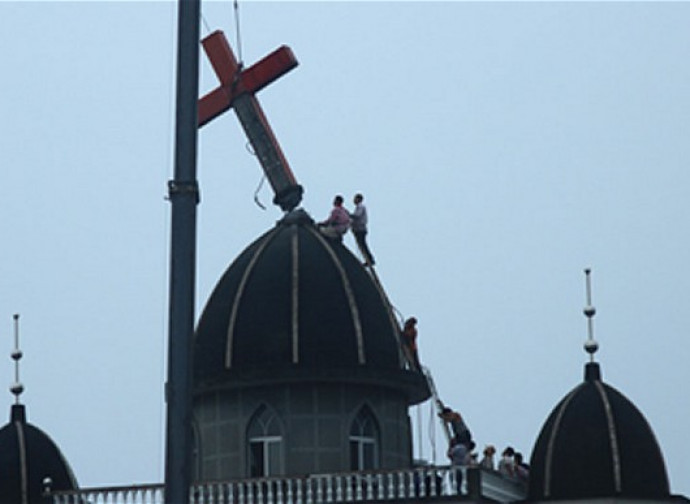Cross removal in China