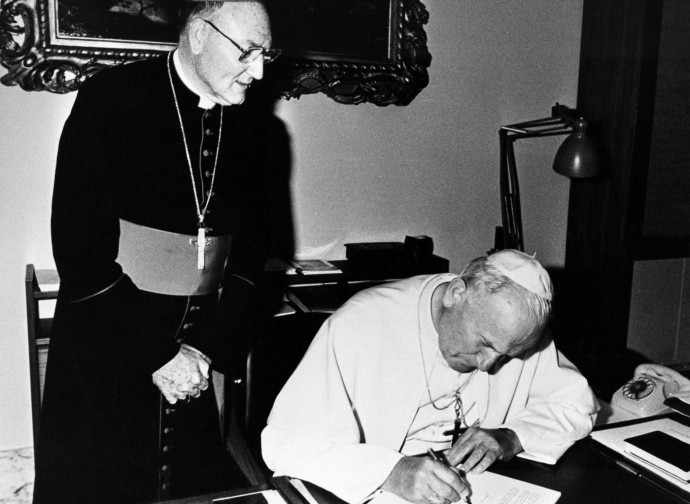 Saint John Paul II signs Veritatis Splendor