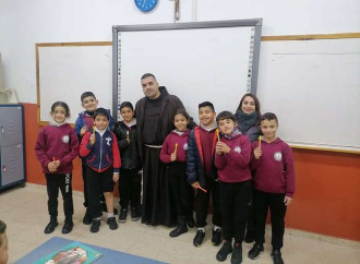 Father George Haddad with some students